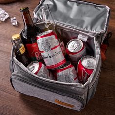 an open cooler bag filled with beer and cans