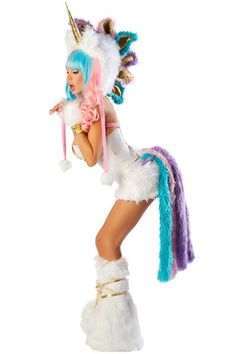 a woman dressed as a unicorn is posing for the camera