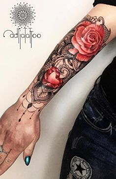 a woman with a rose tattoo on her arm