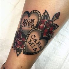 a woman's arm with two hearts and roses in the center, which reads mom cher