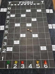 a game board with numbers and figures on it