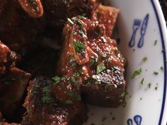 a close up of a plate of food with meat