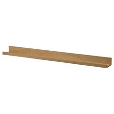 a wooden shelf that is on the wall