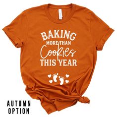 an orange shirt that says adding pumpkin to our patch