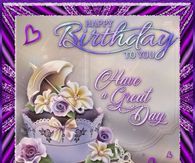 a birthday card with purple flowers and an umbrella on the top, in front of a purple background