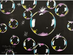 an image of soap bubbles painted on a black background with white stars and sparkles