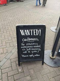 a sign that is on the side of a sidewalk saying, wanted customers no previous experience needed