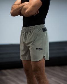 Breathable Functional Short Bottoms, Breathable Functional Shorts, Khaki Athletic Shorts With Built-in Liner, Summer Training Bottoms With Built-in Shorts, Go-dry Gym Shorts, Stretch Athleisure Khaki Shorts, Functional Gym Bottoms With Short Legs, Stretch Khaki Athleisure Shorts, Athleisure Stretch Khaki Shorts