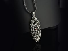 Futuristic Starship Silver Pendant with Red Gemstone for Sci-Fi Enthusiasts - Unique Spaceship Necklace, Cosmic Silver Jewelry, Gothic Gifts 🚀 Journey to the stars with our Futuristic Starship Silver Pendant, a treasure for Sci-Fi enthusiasts and cosmic adventurers alike. This necklace, reminiscent of an interstellar spacecraft, features intricate circuit-like engravings with a central red gemstone, symbolizing the heart of the vessel. Perfect for space opera aficionados or as an eye-catching p Spaceship Necklace, Buddha Jewelry, Jewelry Gothic, Amazonite Necklace, Chevron Necklace, Cheap Necklaces, Gothic Gifts, Red Gemstones, Unique Birthday Gifts