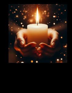 a person holding a lit candle in their hands