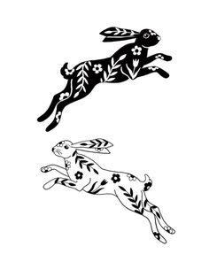 two black and white rabbits flying in the air with flowers on their backs, one is jumping