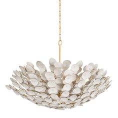 a white chandelier hanging from a gold chain