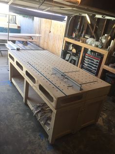 the workbench is being built and ready to be worked on in the shop