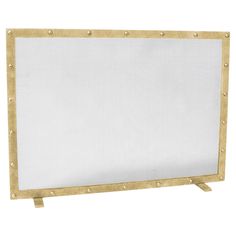 a white screen with gold rivets and studding on the edges, against a white background