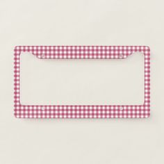 a pink and white gingham license plate frame on a white background with clipping