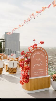 an outdoor ceremony setup with flowers and decorations