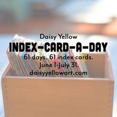 a wooden box filled with lots of different colored cards next to text that reads daisy yellow index card - a - day