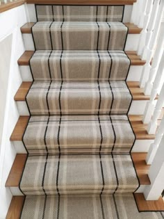 an image of stairs with carpet on them