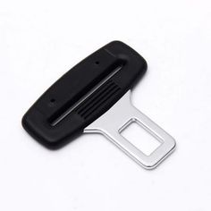 a black plastic clip with a metal handle