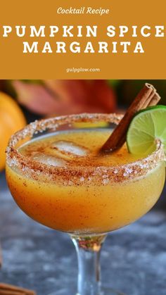 a pumpkin spice margarita with cinnamon and lime garnish