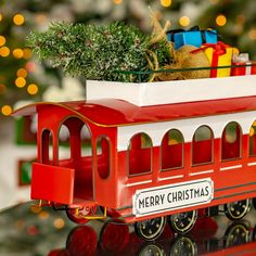 a christmas train with presents on top