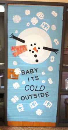 a baby it's cold outside door decoration