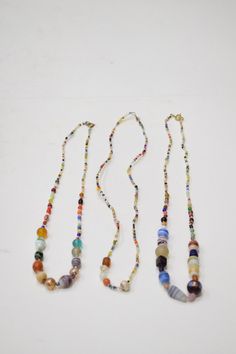 These are 3 wonderful Colorful Assorted Round and Oval Beaded Necklace from India. A truly a wonderful necklace that will compliment any outfit and is lightweight and comfortable to wear. A great gift to give for a women and young girl to wear on all occasions COMES IN A PACKAGE OF 3 AND EACH ONE IS UNIQUE COLORS AND SHAPES OF BEADS WILL VARY 18" - 20" long AT BACARA WE STAND BEHIND ALL OF OUR MERCHANDISE. FULL MONEY BACK GUARANTEE WILL BE PROVIDED FOR DISSATISFIED CUSTOMERS. YOUR SATISFACTION IS OUR MAIN GOAL, AND WE THANK YOU FOR SHOPPING AT BACARA. A 442 Mixed Beads Necklace, Weird Jewelry, Beads Craft Jewelry, Diy Collier, Beaded Necklace Designs, Necklace Tutorial, Bead Necklaces, Beaded Pendant Necklace, Overland Park