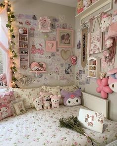 a child's bedroom decorated in pink and white with teddy bears on the wall