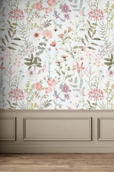 an empty room with floral wallpaper and wooden floors