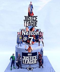 a cake made to look like the justice league