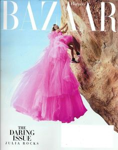 a woman in a pink dress on the cover of bazaar magazine