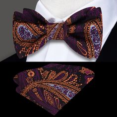 Purple and Orange Paisley Bow Tie Looking to elevate your style with a unique and eye-catching accessory? Look no further than our luxurious purple and orange paisley bow tie, paired with a stunning purple and gold accenting pocket square. This bow tie is the perfect way to add a pop of color and sophistication to any outfit, whether you're attending a formal event or simply looking to spice up your everyday attire. Crafted from the highest quality materials, this paisley bow tie is both comfort Purple And Gold Bow Tie, Gold Pocket Square, Suit Handkerchief, Types Of Bows, Tie Matching, Silk Bow Ties, Purple And Orange, Tie Colors, Jacquard Weave