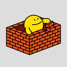 a yellow smiley face sitting on top of a red brick wall with his arms and legs stretched out