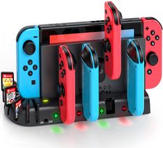 four nintendo wii game controllers are stacked on top of each other