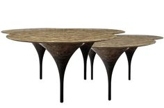 three tables with marble top and metal legs on each side, set against a white background