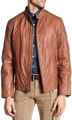 "Elevate your style with the Cole Haan Men's Washed Leather Moto Jacket in Cognac from Amazon. Embrace the perfect blend of sophistication and edge. Ideal for leather, puffer, and hoodie enthusiasts. Make a statement effortlessly! #ColeHaan #LeatherJacket #AmazonFashion" Mens Biker Style, Stand Collar Jackets, Fashionable Snow Boots, Leather Stand, Cole Haan Men, Classic Coats, Biker Leather, Genuine Leather Jackets, Goat Leather