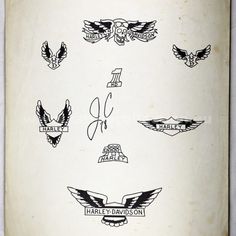 an old book with many different logos and symbols on the pages, including eagle emblems