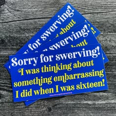 three blue stickers that say sorry for serving and i was thinking about something embarrasing i did when i was sixteen