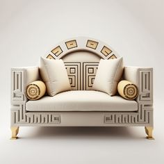 a white couch with two pillows on it's back and an arch in the middle