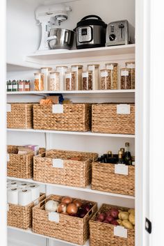 an organized pantry with baskets and food items