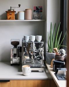 a coffee machine sitting on top of a counter