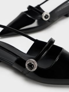 An elegant pair of slingback flats will serve you well, and this pair certainly will. The pointed toes and glossy patent finish create a striking silhouette that is still versatile enough to match with most outfits. Thin buckled straps across the vamps add a feminine flair, which is further enhanced with sparkly crystal embellishments. Complete with adjustable slingback straps for a customised fit, these shoes balance comfort with sophistication. Slingback Flats, Faux Leather Heels, Charles Keith, Mary Jane Flats, Low Block Heels, Weekend Outfit, The Vamps, Black Flats, Casual Chic