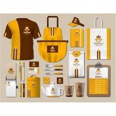 a yellow and brown business stationery set with coffee cups, napkins, paper bags, pens and other items