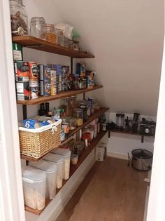 the pantry is stocked with all kinds of food