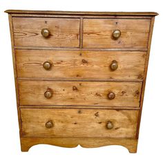 an old wooden chest of drawers with brass knobs on the top and bottom, isolated against a white background