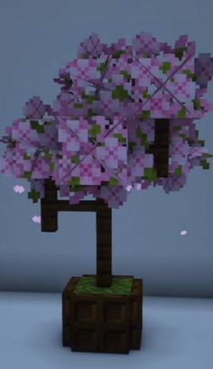 a small tree with pink flowers on it