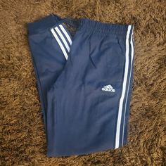 Women's Adidas Joggers Size Medium. They Are A Dark Navy Blue Color Never Worn In Excellent Condition Smoke Free Home I Accept Most Offers Sporty Blue Joggers With Three Stripes Branding, Blue Sports Joggers With Three Stripes, Blue Sports Joggers With Three Stripes Branding, Blue Joggers With Three Stripes For Sports, Blue Joggers With Three Stripes Branding For Sports, Blue Sportswear Joggers With Three Stripes, Blue Three Stripes Joggers Sportswear, Blue Athleisure Pants With Three Stripes Branding, Adidas Blue Sweatpants For Sports