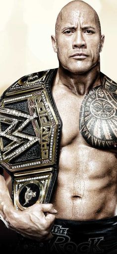 the rock holding his wwe championship belt