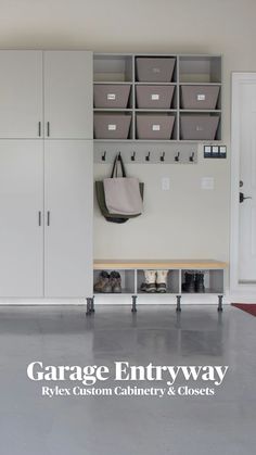 the garage entryway is clean and ready to be used as a storage area for shoes