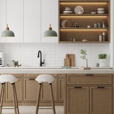 two stools are in front of the kitchen counter